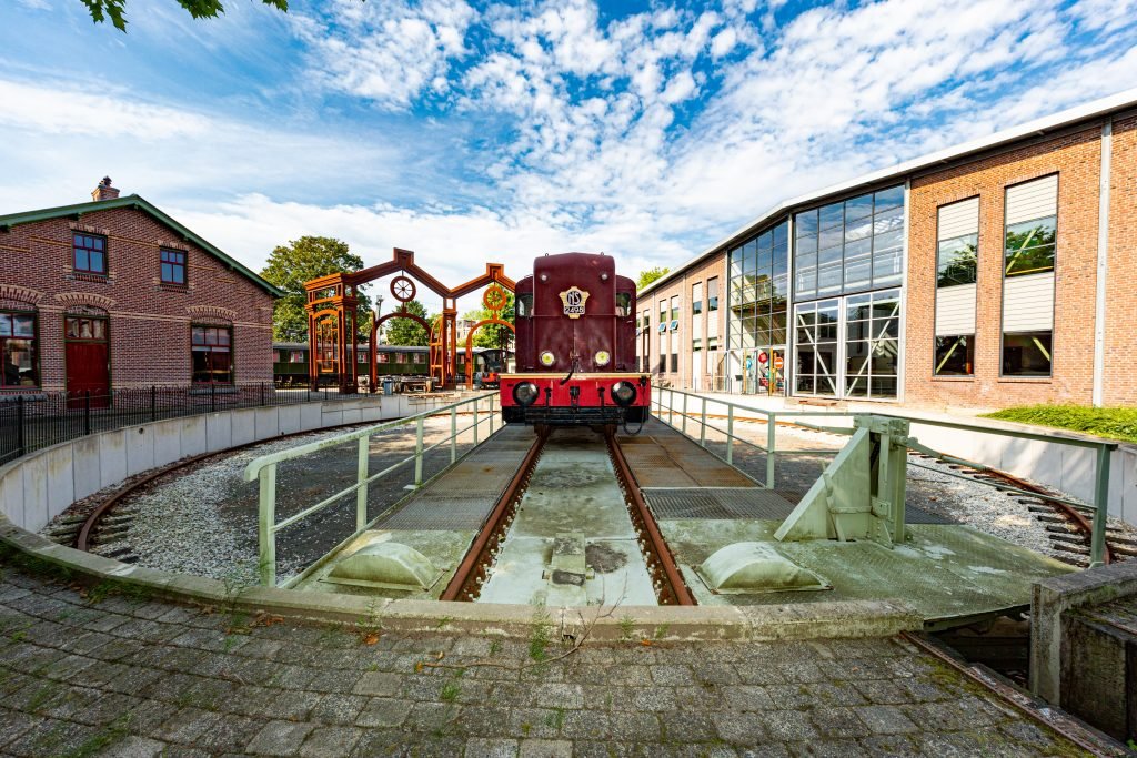 Spoorwegmuseum Utrecht outside view including train set and building