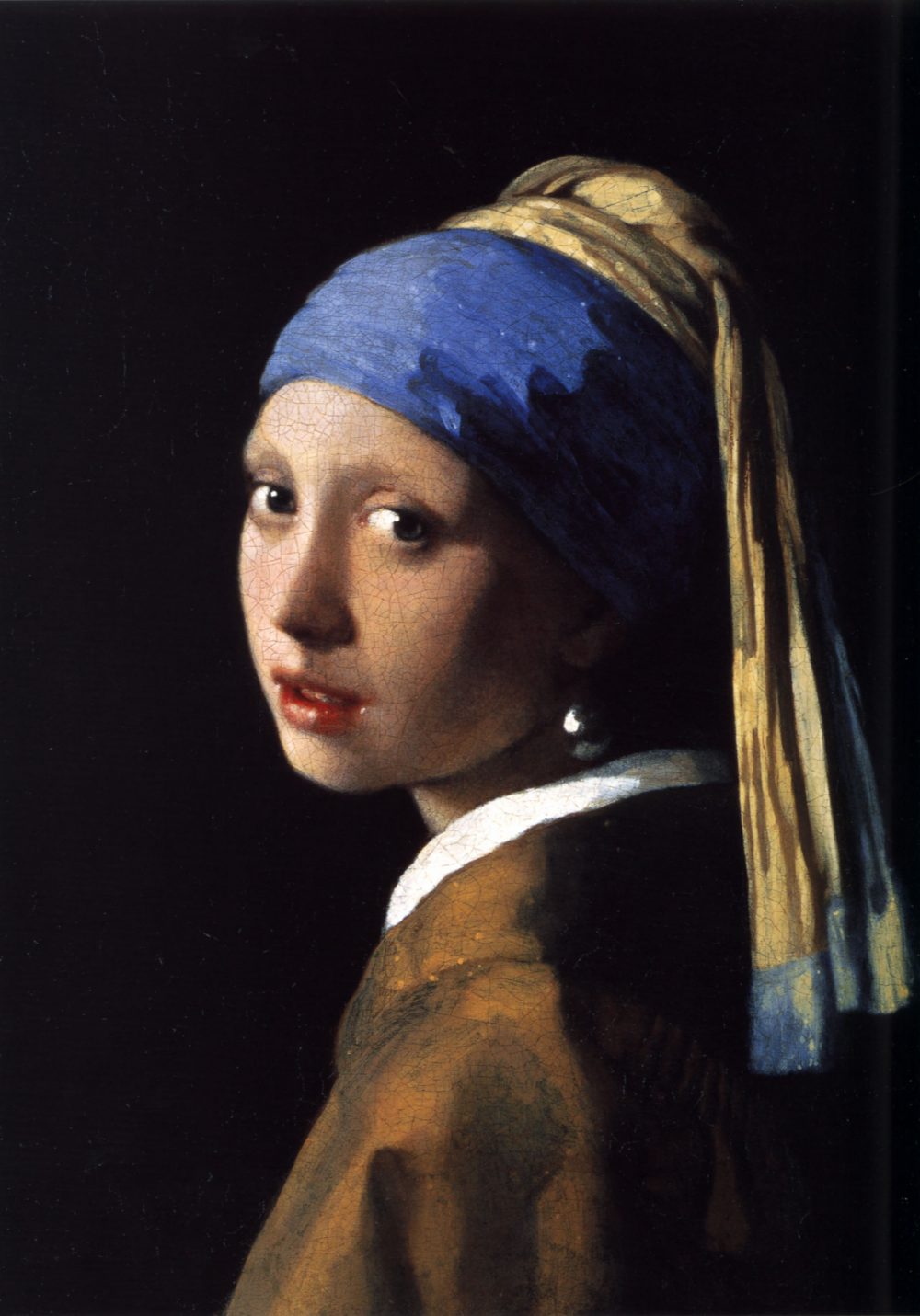 The Girl with the Pearl Earring by Johannes Vermeer, featuring a young woman in a blue and gold turban with a luminous pearl earring, set against a dark background

