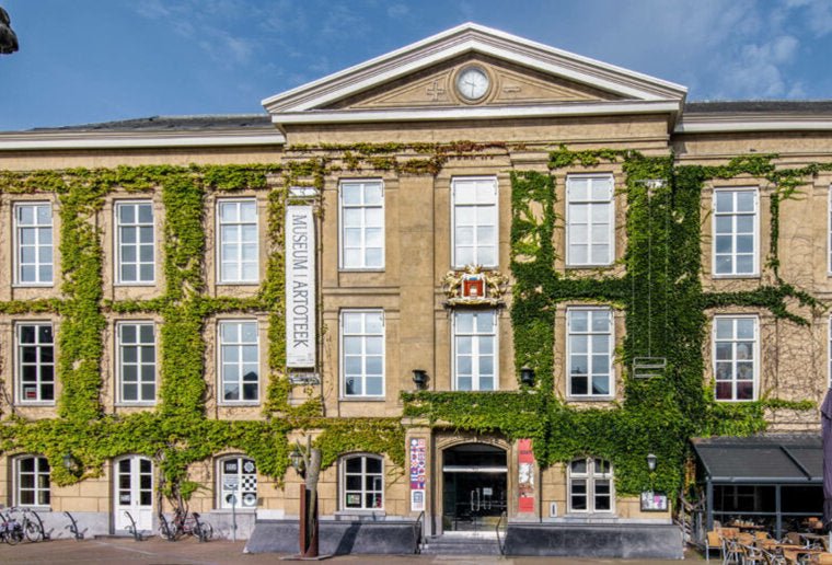 Gorcums Museum Gorinchem frontal view where you see plants growing up the building