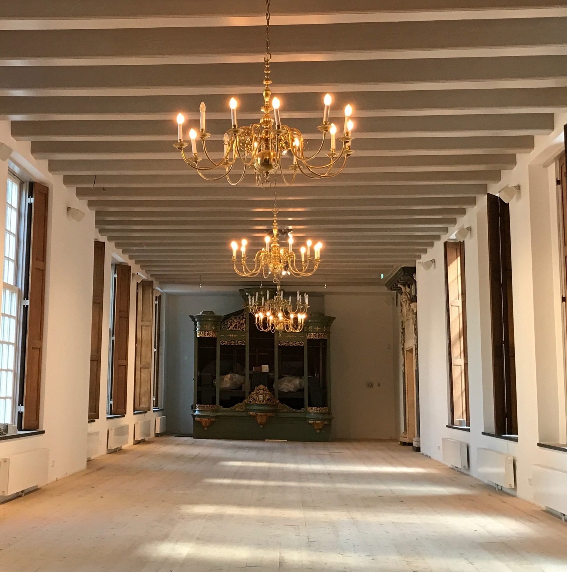 Luther Museum Amsterdam inside view of a classical room with beautiful chandelier