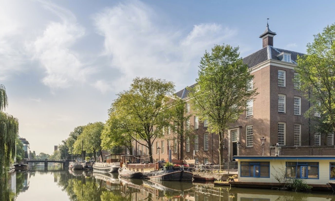 Luther Museum Amsterdam view from the canals on a sunny day
