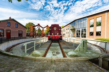 Spoorwegmuseum Utrecht outside view including train set and building