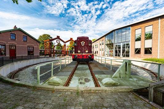 Spoorwegmuseum Utrecht outside view including train set and building